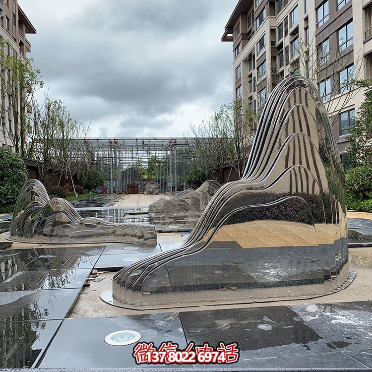 假山雕塑+不銹鋼噴泉，完美結(jié)合抽象鏡面美學(xué)