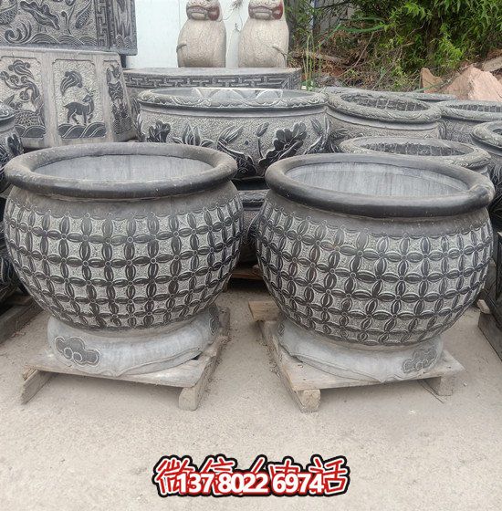 自然美學(xué)結(jié)合青石石雕、浮雕、編織、雕塑的戶外園林魚缸