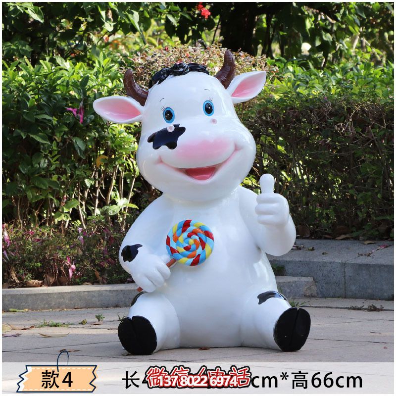 幼兒園一只拿棒棒糖的玻璃鋼卡通牛雕塑 幼兒園一只拿棒棒糖的玻璃鋼卡通牛雕塑